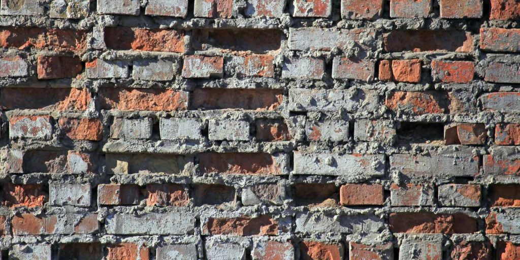 Old brick needing masonry restoration
