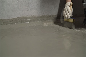 painting Cementitious Waterproofing on the floor
