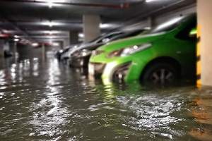 A flooded basement carpark. Waterproofing is a process that prevents moisture from entering a basement
