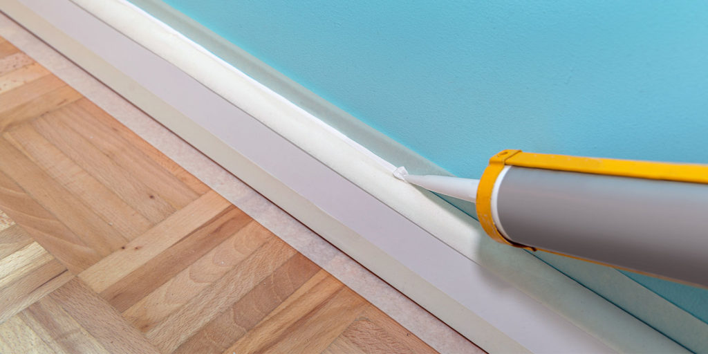 interior caulking being done in a home