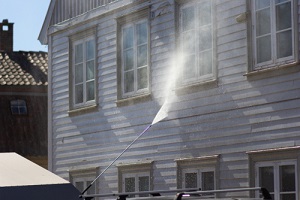 high pressure cleaning of wall house from pressure washing services