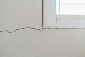 A wall crack started from near the window