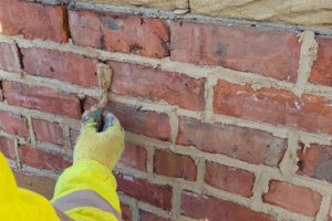 Repointing of a brick wall with Liam