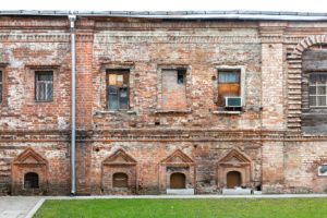 Restoration of a damaged brick wall building