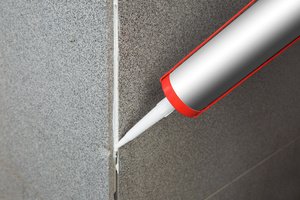 Filling cracks with concrete sealer