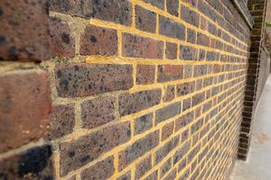 A brick wall after tuckpointing