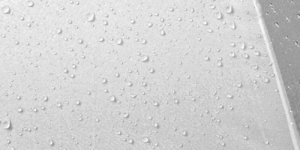 water drops on waterproof fabric background