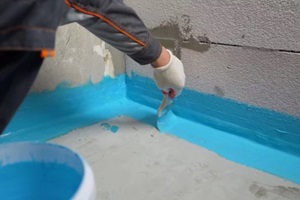 cover the concrete wall with a cement-polymer waterproofing membrane